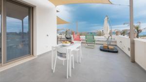 Un balcon sau o terasă la Arabel open space