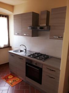 Kuchyňa alebo kuchynka v ubytovaní La Casa del Gigli