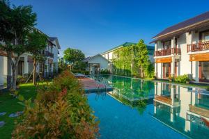 een afbeelding van een zwembad in een villa bij Cocoon Villa in Hội An