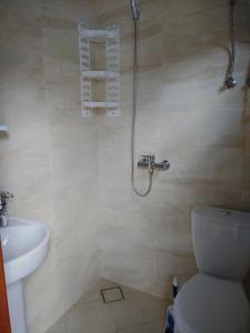 Koupelna v ubytování Mini Hotel Уютный дворик + 37 fotografií