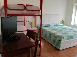 Letto o letti in una camera di Paradiso