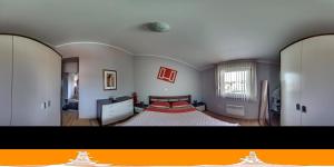 Postel nebo postele na pokoji v ubytování Apartments Saric
