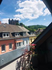 a view of a city from a balcony at Ferienwohnung in Binger Stadtmitte mit Balkon in Bingen am Rhein