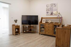 TV a/nebo společenská místnost v ubytování Apartments Gerda