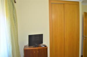 TV a/nebo společenská místnost v ubytování Casa Límia