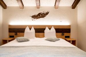 Postel nebo postele na pokoji v ubytování Hotel Hemizeus & Iremia Spa