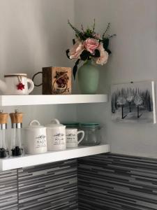 Příslušenství pro přípravu čaje a kávy v ubytování Studio apartman Braco