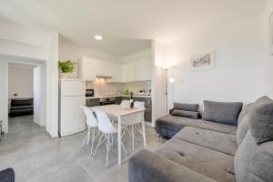 Kuchyň nebo kuchyňský kout v ubytování Apartments Mimac + 37 fotografií