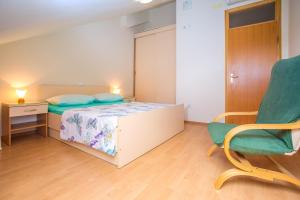 Ένα ή περισσότερα κρεβάτια σε δωμάτιο στο Apartmani Ribnjak Seka