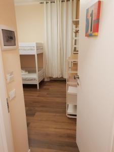 Posteľ alebo postele v izbe v ubytovaní Glam Resort G H O S T E L