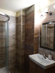 a bathroom with a sink and a shower at Apartmány Matilda in Pribylina