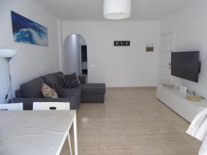 Telewizja i/lub zestaw kina domowego w obiekcie Apartamento Medanero FGF