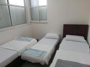 Postel nebo postele na pokoji v ubytování Sheffer