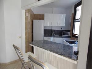 Kuchnia lub aneks kuchenny w obiekcie Apartamento Medanero FGF