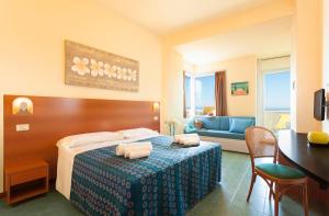 Postel nebo postele na pokoji v ubytování Hotel Atlantic Vista Mare