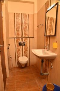 Koupelna v ubytování Ananda Residency