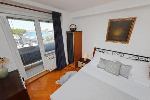 Posteľ alebo postele v izbe v ubytovaní Apartment Ana & Marko
