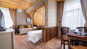 Postel nebo postele na pokoji v ubytování Parus Boutique Hotel