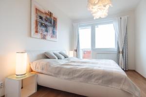 Posteľ alebo postele v izbe v ubytovaní Prostorný 3 pokojový apartmán s dvěma terasami