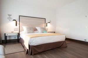 Katil atau katil-katil dalam bilik di Parador de Lleida