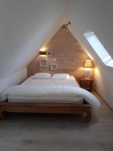 En eller flere senge i et værelse på La petite Juliette