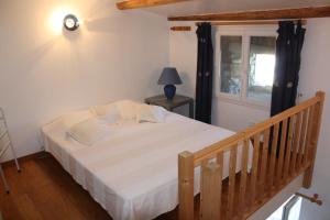 Ένα ή περισσότερα κρεβάτια σε δωμάτιο στο L'Avventura gîte bleu