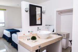 Postel nebo postele na pokoji v ubytování Hotel MB