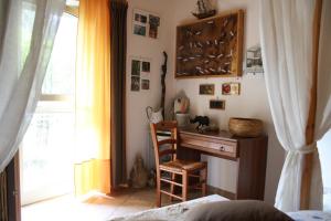 Postel nebo postele na pokoji v ubytování Mini suite alla Cascata