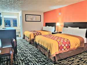 Postel nebo postele na pokoji v ubytování Travel Inn Eutaw