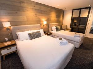 Postel nebo postele na pokoji v ubytování Crown Hotel Surry Hills
