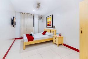 Postelja oz. postelje v sobi nastanitve RedDoorz near Cebu Metropolitan Cathedral