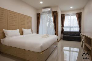 Cama o camas de una habitación en Pak Ping Ratchabur