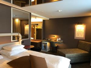 Un pat sau paturi într-o cameră la Original Sokos Hotel Seurahuone Kotka