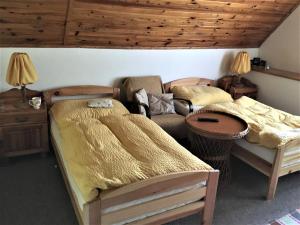 Postel nebo postele na pokoji v ubytování Penzion Trattoria