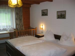 Postel nebo postele na pokoji v ubytování Appartements Bischof