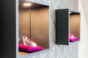 Letto o letti in una camera di Hotel Hagnauer Seeperle