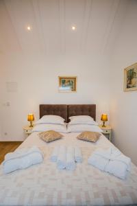 Postel nebo postele na pokoji v ubytování Heritage Hotel Dea Hvar