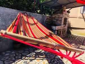 a pile of colored ropes on a hammock at Mandarin in Makhinjauri