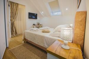 Postel nebo postele na pokoji v ubytování Heritage Hotel Dea Hvar