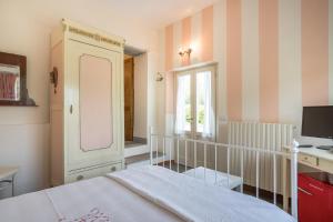 Postel nebo postele na pokoji v ubytování B&B Rosso Baccara