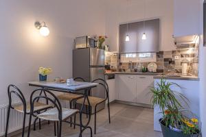 Kuchyňa alebo kuchynka v ubytovaní Marveco Apartment + 19 fotografií
