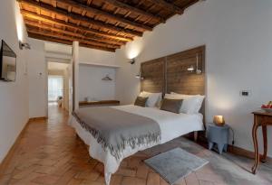 A bed or beds in a room at Casa Modelli