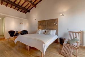 A bed or beds in a room at Casa Modelli