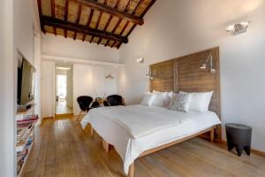 A bed or beds in a room at Casa Modelli