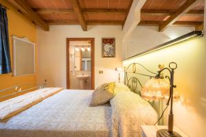 Postel nebo postele na pokoji v ubytování B&B Rosso Baccara