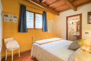 Postel nebo postele na pokoji v ubytování B&B Rosso Baccara