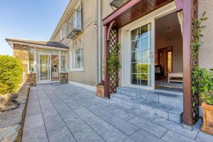 a home with a pathway leading to the front door at Shearwater Self Catering in Union Hall