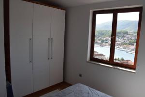 Postel nebo postele na pokoji v ubytování BellaVista Jelsa 2+2