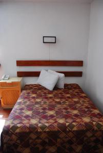 Postel nebo postele na pokoji v ubytování Hotel Alux Cancun