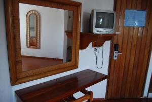 TV tai viihdekeskus majoituspaikassa Hotel Alux Cancun